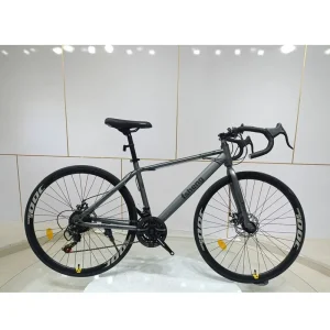 Men’s Adult Road Bike Featuring a High Carbon Steel Frame Front and Rear Disc Brakes and Narrow Tires